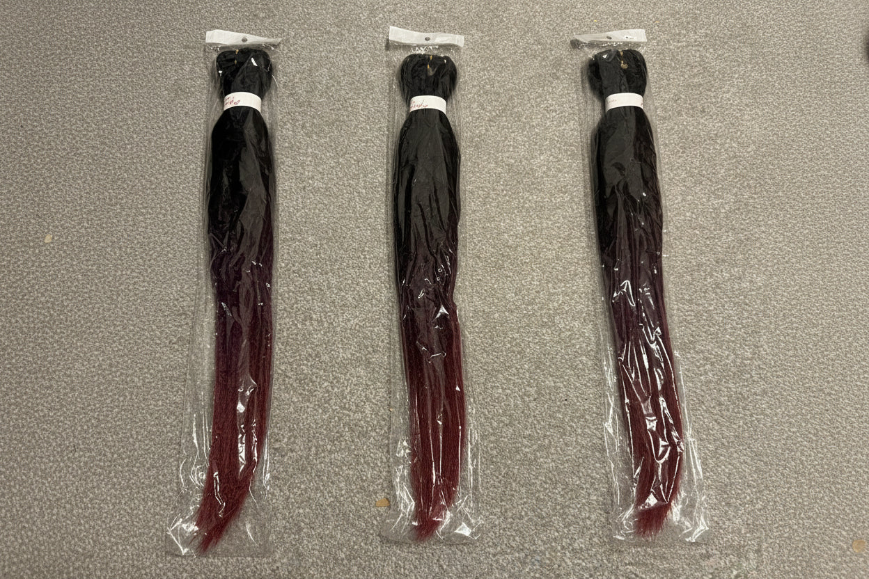 Pre-stretched braid hair extension black with auburn